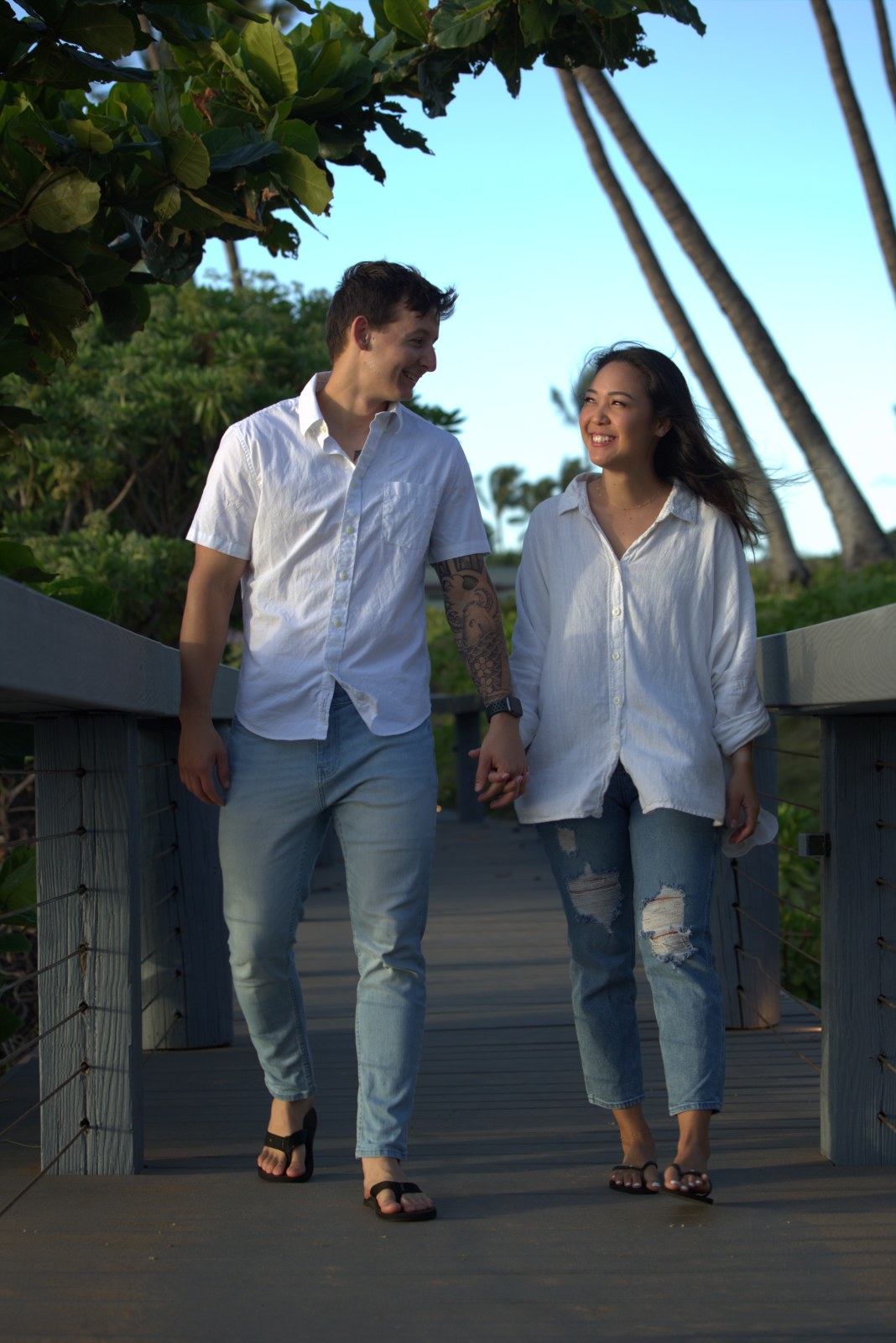 Tanner and his wife on a boardwalk on Maui, off shift